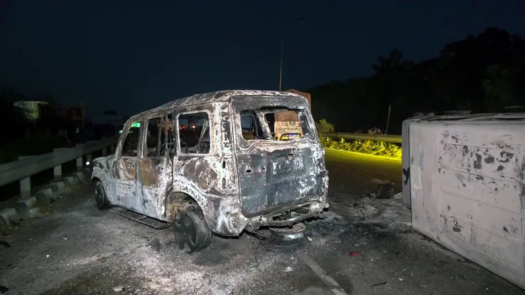A view of the completely gutted vehicle(s) following the protests by the students of Lovely Professional University (LPU) that turned violent over the alleged rape of a female student and inaction by the authorities in Phagwara, Kapurthala, on Monday. (ANI Video Grab)